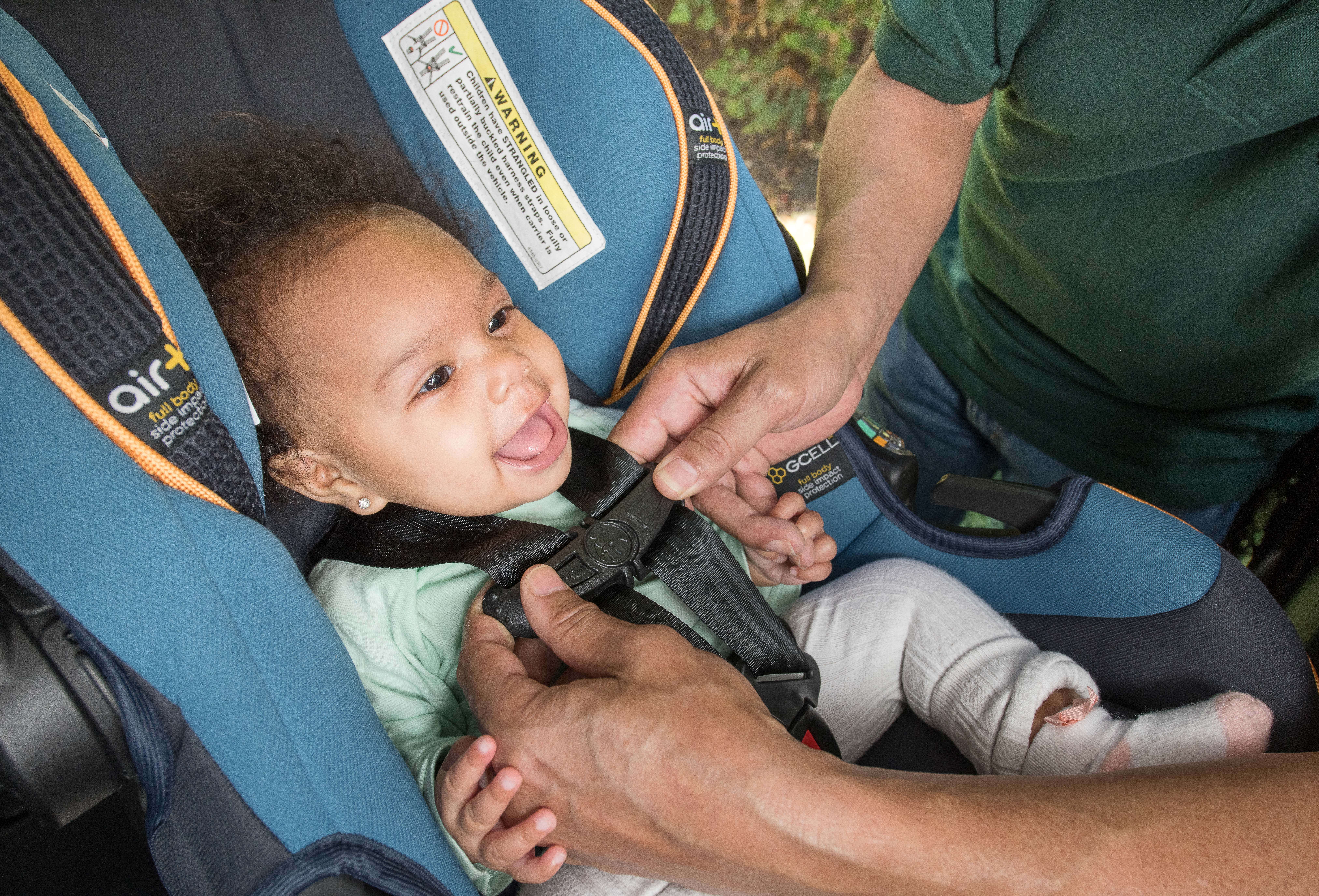 Happy baby safe in car seat